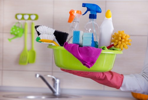Professional cleaner preparing a kitchen in W1G for a property handover