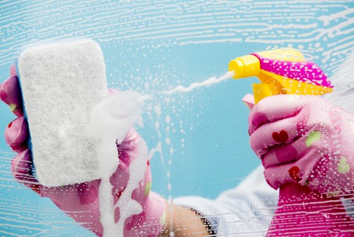 A professional deep cleaning team working in a W1G home interior