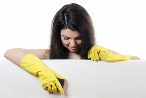 Local cleaners preparing a W1G home for move-in with detailed dusting